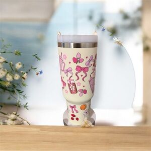 Beige coffee and bow tumbler